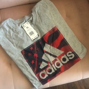Brand New with tags Men’s Adidas Grey , blue & with Red stars , size XL